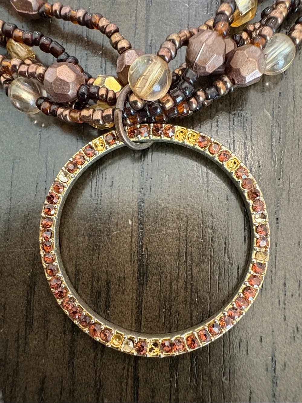 Multi-Strand Brown and Gold Beaded Necklace with Circular Pendant